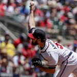 
              Atlanta Braves' Ian Anderson pitches against the Los Angeles Angels during the first inning of a baseball game Sunday, July 24, 2022, in Atlanta. (AP Photo/Butch Dill)
            