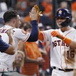 
              Houston Astros' Aledmys Diaz, right, is high-fived by Alex Bregman after hitting a two-run home run off Kansas City Royals relief pitcher Jackson Kowar during the seventh inning of a baseball game Tuesday, July 5, 2022, in Houston. (AP Photo/Kevin M. Cox)
            