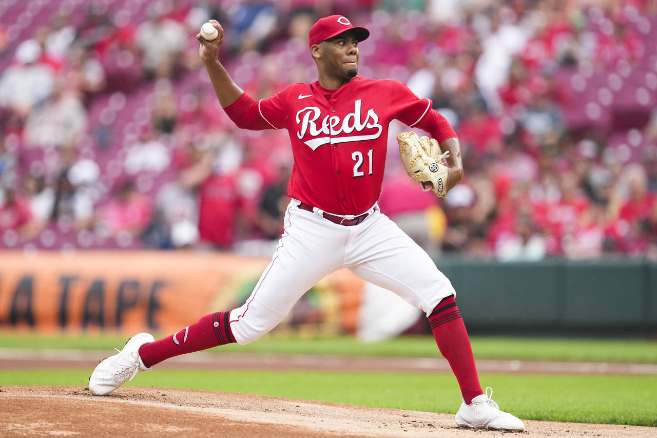 Cincinnati Reds starting pitcher Hunter Greene throws during the first inning of a baseball game ag...