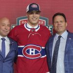 
              Juraj Slafkovsky poses for photos after being selected as the top pick in the first round of the NHL hockey draft by the Montreal Canadiens in Montreal on Thursday, July 7, 2022. (Ryan Remiorz/The Canadian Press via AP)
            