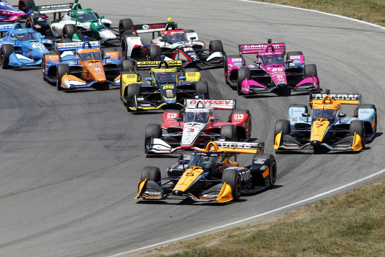 Pato O'Ward leads the field at the drop of the green flag during an IndyCar auto race at Mid-Ohio S...