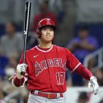 
              Los Angeles Angels' Shohei Ohtani prepares to bat during the seventh inning of the team's baseball game against the Miami Marlins, Tuesday, July 5, 2022, in Miami. (AP Photo/Lynne Sladky)
            