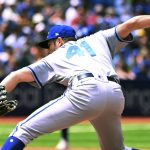 
              Kansas City Royals relief pitcher Wyatt Mills throws to a Toronto Blue Jays batter in the eighth inning of a baseball game in Toronto, Sunday, July 17, 2022. (Jon Blacker/The Canadian Press via AP)
            