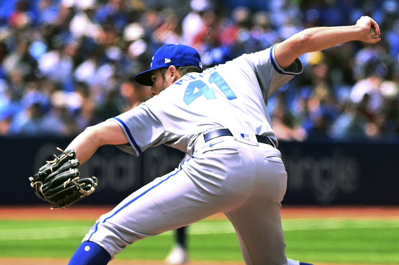 Kansas City Royals relief pitcher Wyatt Mills throws to a Toronto Blue Jays batter in the eighth in...