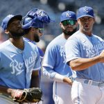 
              Kansas City Royals manager Mike Matheny, right, reacts to Amir Garrett, left, as the relief pitcher is taken out of the baseball game as catcher MJ Melendez, second from left, and third baseman Emmanuel Rivera, second from right, wait on the mound during the seventh inning against the Detroit Tigers in Kansas City, Mo., Wednesday, July 13, 2022. (AP Photo/Colin E. Braley)
            