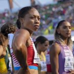 
              Allyson Felix, of the United States, waits to run in a heat of the women's 4x400-meter relay at the World Athletics Championships on Saturday, July 23, 2022, in Eugene, Ore.(AP Photo/David J. Phillip)
            