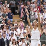 
              Germany's Tatjana Maria celebrates defeating Latvia's Jelena Ostapenko during a fourth round women's singles match on day seven of the Wimbledon tennis championships in London, Sunday, July 3, 2022. (AP Photo/Alberto Pezzali)
            