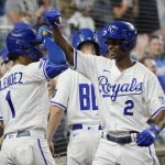 
              Kansas City Royals' Michael A. Taylor (2) celebrates his home run with MJ Melendez (1) in the eighth inning against the Tampa Bay Rays during a baseball game Saturday, July 23, 2022, in Kansas City, Mo. (AP Photo/Ed Zurga)
            