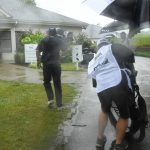 
              Yannik Paul, left, and caddie Oliver Briggs retreat to the clubhouse after third round play in the Barbasol Championship golf tournament is suspended due to inclement weather Saturday, July 9, 2022, in Nicholasville, Ky. (AP Photo/John Amis)
            