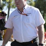
              FILE - Zak Brown, CEO of McLaren, arrives at the track for the Australian Formula One Grand Prix in Melbourne, Thursday, March 12, 2020. There is no love lost between rival team owners Chip Ganassi and Zak Brown, and the two now find themselves entangled over the reigning IndyCar champion. Ganassi says he picked up the option on Alex Palou for 2023, but McLaren Racing says it has signed the Spaniard for next year. (AP Photo/Andy Brownbill, File)
            