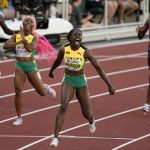 
              Shericka Jackson, of Jamaica, wins the final of the women's 200-meter run ahead of Shelly-Ann Fraser-Pryce, of Jamaica, at the World Athletics Championships on Thursday, July 21, 2022, in Eugene, Ore. (AP Photo/Gregory Bull)
            