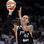 
              FILE - Phoenix Mercury center Brittney Griner (42) shoots during the first half of Game 1 of the WNBA basketball Finals against the Chicago Sky, on Oct. 10, 2021, in Phoenix. Jailed American basketball star Brittney Griner returns to a Russian court Thursday July 7, 2022, as calls increase for Washington to do more to secure her release. Griner was detained in February at a Moscow airport after vape canisters with cannabis oil allegedly were found in her luggage.  (AP Photo/Ralph Freso, File)
            