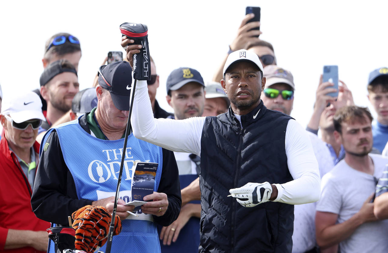 U.S golfer Tiger Woods prepares to tee off on the 7th hole during a practice round at the British O...
