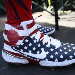 
              Washington Nationals' Nelson Cruz wears patriotic themed shoes before a baseball game against the Miami Marlins, Monday, July 4, 2022, in Washington. (AP Photo/Nick Wass)
            