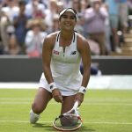 
              Britain's Heather Watson celebrates defeating Slovenia's Kaja Juvan in a third round women's singles match on day five of the Wimbledon tennis championships in London, Friday, July 1, 2022. (AP Photo/Alastair Grant)
            