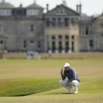 
              Scottie Scheffler of the US lines up a putt on the 17th green during the second round of the British Open golf championship on the Old Course at St. Andrews, Scotland, Friday July 15, 2022. The Open Championship returns to the home of golf on July 14-17, 2022, to celebrate the 150th edition of the sport's oldest championship, which dates to 1860 and was first played at St. Andrews in 1873. (AP Photo/Alastair Grant)
            