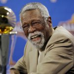 
              FILE - NBA great Bill Russell reacts at a news conference as he learns the most valuable player award for the NBA basketball championships has been renamed the Bill Russell NBA Finals Most Valuable Player Award, Feb. 14, 2009, in Phoenix. Russell has died at age 88. His family said on social media that Russell died on Sunday, July 31, 2022. Russell anchored a Boston Celtics dynasty that won 11 titles in 13 years. (AP Photo/Matt York, file)
            
