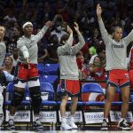 
              Washington Mystics on the bench celebrate a 3-pointer against the Dallas Wings during the first half of a WNBA basketball game Thursday, July 28, 2022, in Arlington, Texas. (Rebecca Slezak/The Dallas Morning News via AP)
            