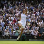 
              France's Caroline Garcia celebrates defeating Britain's Emma Raducanu in a singles tennis match on day three of the Wimbledon tennis championships in London, Wednesday, June 29, 2022. (AP Photo/Alastair Grant)
            