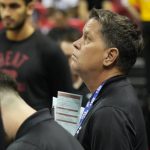 
              Miami Heat assistant Tim Cone, right, watches during the first half an NBA summer league basketball game against the Atlanta Hawks, Tuesday, July 12, 2022, in Las Vegas. (AP Photo/John Locher)
            