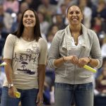 
              FILE - Former University of Connecticut and current WNBA players Sue Bird, left, and Diana Taurasi, right, share a laugh as they are introduced at UConn's First Night program in Storrs, Conn., Friday, Oct. 13, 2006. Seattle's Sue Bird and Mercury star Diana Taurasi share the court perhaps for the last time in a WNBA clash in Phoenix, Friday, July 22, 2022.(AP Photo/Jessica Hill, File)
            