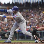 
              Chicago Cubs' Ian Happ strikes out against the San Francisco Giants during the third inning of a baseball game in San Francisco, Saturday, July 30, 2022. (AP Photo/Godofredo A. Vásquez)
            