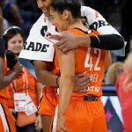 
              Team Wilson's Kelsey Plum, right, is congratulated by A'ja Wilson after Team Wilson defeated Team Stewart in a WNBA All-Star basketball game in Chicago, Sunday, July 10, 2022. (AP Photo/Nam Y. Huh)
            