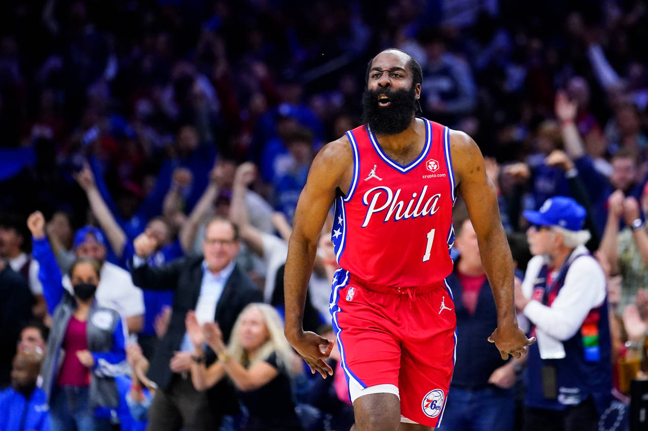 FILE - Philadelphia 76ers' James Harden reacts during the first half of Game 4 of an NBA basketball...