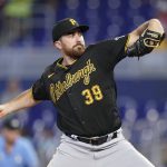 
              Pittsburgh Pirates' Zach Thompson delivers a pitch during the first inning of a baseball game against the Miami Marlins, Thursday, July 14, 2022, in Miami. (AP Photo/Wilfredo Lee)
            
