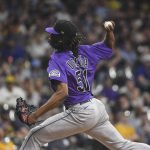 
              Colorado Rockies' Jose Urena pitches to a Milwaukee Brewers batter during the fifth inning of a baseball game Saturday, July 23, 2022, in Milwaukee. (AP Photo/Kenny Yoo)
            