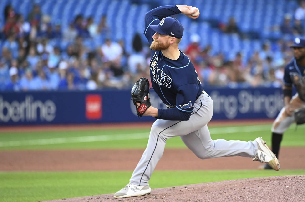 Tampa Bay Rays starting pitcher Drew Rasmussen throws to a Toronto Blue Jays batter during the firs...
