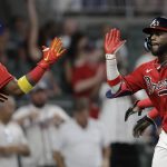 
              Atlanta Braves' Michael Harris II, right, celebrates with Ronald Acuña Jr. (13) after hitting a two-run home run in the eighth inning of a baseball game against the Washington Nationals on Friday, July 8, 2022, in Atlanta. (AP Photo/Ben Margot)
            