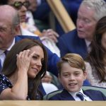 
              Britain's Kate, Duchess of Cambridge and Britain's Prince George sit in the Royal box for the final of the men's singles between Serbia's Novak Djokovic and Australia's Nick Kyrgios on day fourteen of the Wimbledon tennis championships in London, Sunday, July 10, 2022. (AP Photo/Alastair Grant)
            