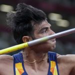 
              FILE -Neeraj Chopra, of India, competes in the men's javelin throw final at the 2020 Summer Olympics, Saturday, Aug. 7, 2021, in Tokyo. (AP Photo/Matthias Schrader)
            