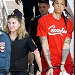 
              WNBA star and two-time Olympic gold medalist Brittney Griner is escorted to a courtroom for a hearing, in Khimki just outside Moscow, Russia, Thursday, July 7, 2022. Jailed American basketball star Brittney Griner returns to a Russian court on Thursday amid a growing chorus of calls for Washington to do more to secure her release nearly five months after being arrested on drug charges. (AP Photo/Alexander Zemlianichenko)
            