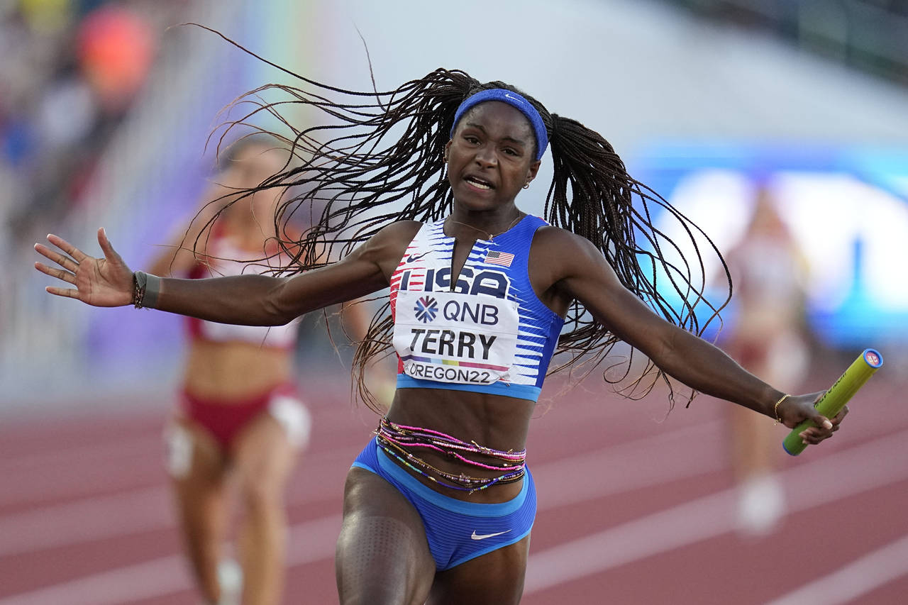 Twanisha Terry, of the United States, wins the final in the women's 4x100-meter relay at the World ...