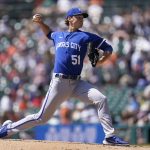 
              Kansas City Royals pitcher Brady Singer throws against the Detroit Tigers in the first inning of a baseball game in Detroit, Sunday, July 3, 2022. (AP Photo/Paul Sancya)
            
