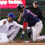 
              Chicago Cubs second baseman Christopher Morel, left, tags out Boston Red Sox's Franchy Cordero at second base during the second inning of a baseball game in Chicago, Saturday, July 2, 2022. (AP Photo/Nam Y. Huh)
            