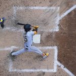 
              Pittsburgh Pirates' Oneil Cruz hits a home run during the sixth inning of a baseball game against the Milwaukee Brewers Sunday, July 10, 2022, in Milwaukee. (AP Photo/Morry Gash)
            