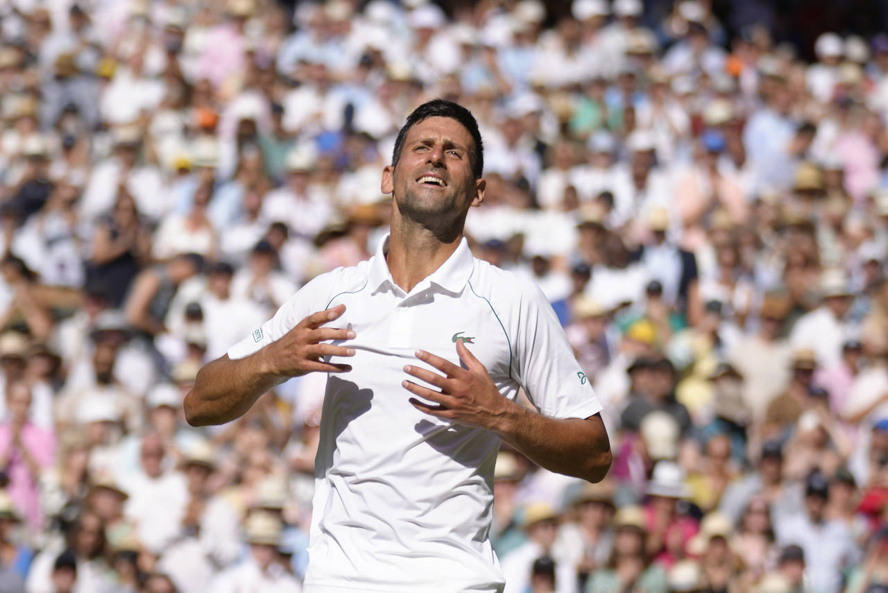 Serbia's Novak Djokovic celebrates after beating Australia's Nick Kyrgios to win the final of the m...