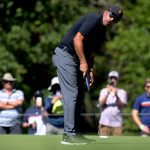 
              Phil Mickelson watches his putt on the 16th hole during the second round of the Portland Invitational LIV Golf tournament in North Plains, Ore., Friday, July 1, 2022. (AP Photo/Steve Dipaola)
            