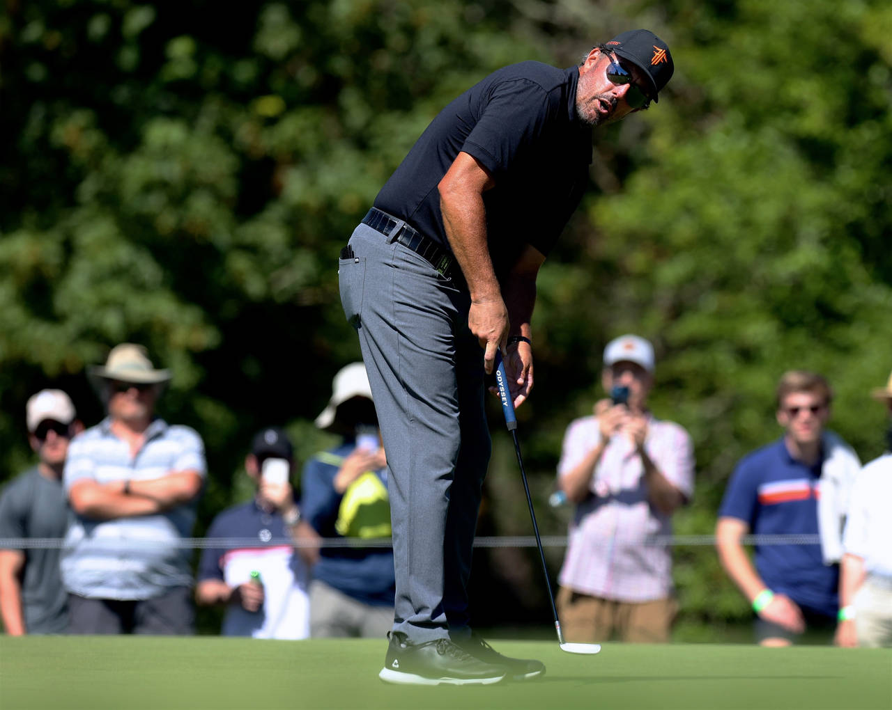 Phil Mickelson watches his putt on the 16th hole during the second round of the Portland Invitation...