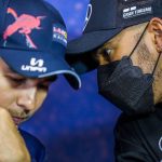 
              Mercedes driver Lewis Hamilton of Britain, right, talks with Red Bull driver Sergio Perez of Mexico during a press conference ahead of the French Formula One Grand Prix at the Paul Ricard racetrack in Le Castellet, southern France, Thursday, July 21, 2022. The French Grand Prix will be held on Sunday. (AP Photo/Manu Fernandez)
            
