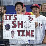 
              A fans holds up a sign for Los Angeles Angels starting pitcher Shohei Ohtani before a baseball game between the Miami Marlins and the Angels, Wednesday, July 6, 2022, in Miami. (AP Photo/Lynne Sladky)
            
