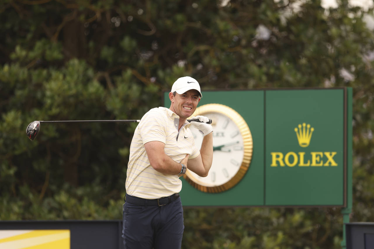 Rory McIlroy of Northern Ireland watches his shot from the 3rd tee during the final round of the Br...