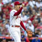 
              Los Angeles Angels starting pitcher Shohei Ohtani reacts after striking out Texas Rangers' Leody Taveras with the bases loaded during the first inning of a baseball game in Anaheim, Calif., Thursday, July 28, 2022. (AP Photo/Alex Gallardo)
            