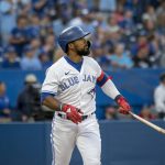 
              Toronto Blue Jays right fielder Teoscar Hernandez (37) watches his home run during the fourth inning of a baseball game against the Philadelphia Phillies, Wednesday, July 13, 2022 in Toronto. (Christopher Katsarov/The Canadian Press via AP)
            