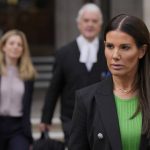 
              FILE - Rebekah Vardy departs the High Court in London, Thursday, May 19, 2022. On Friday, July 29, 2022, Judge Karen Steyn has cleared Coleen Rooney of libeling Vardy when she alleged that Vardy had leaked her private social media posts to the tabloid press. (AP Photo/Alastair Grant, File)
            