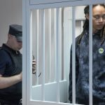 
              WNBA star and two-time Olympic gold medalist Brittney Griner stands in a cage at a court room prior to a hearing, in Khimki just outside Moscow, Russia, Tuesday, July 26, 2022. American basketball star Brittney Griner has returned to a Russian courtroom for her drawn-out trial on drug charges that could bring her 10 years in prison if convicted. (AP Photo/Alexander Zemlianichenko, Pool)
            