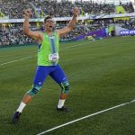 
              Kristjan Ceh, of Slovenia, celebrates after winning the gold medal in the final of the men's discus throw at the World Athletics Championships on Tuesday, July 19, 2022, in Eugene, Ore. (AP Photo/David J. Phillip)
            